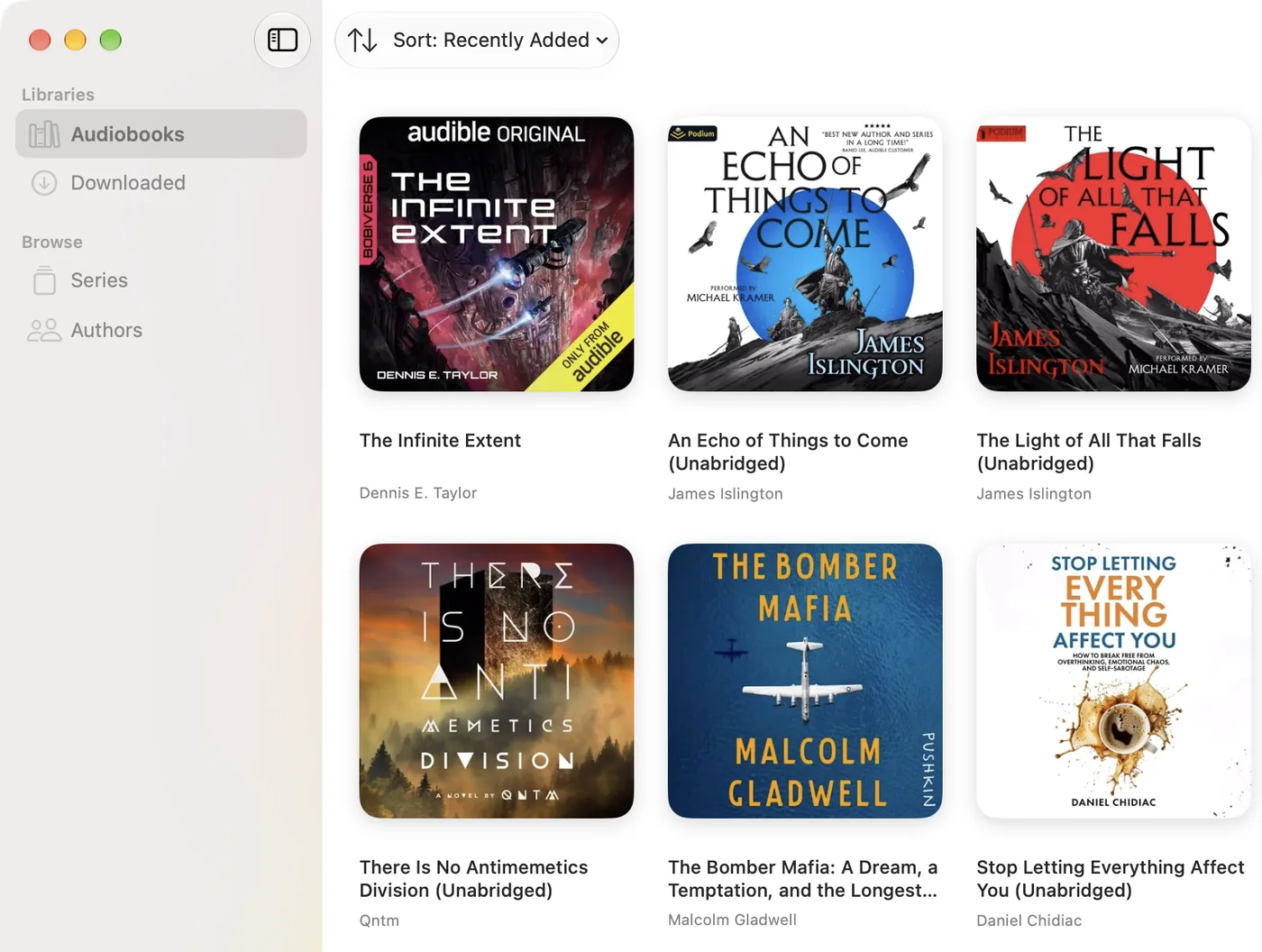 The Audibounce Library window showing audiobook covers in a grid with a sidebar of libraries, series and authors.